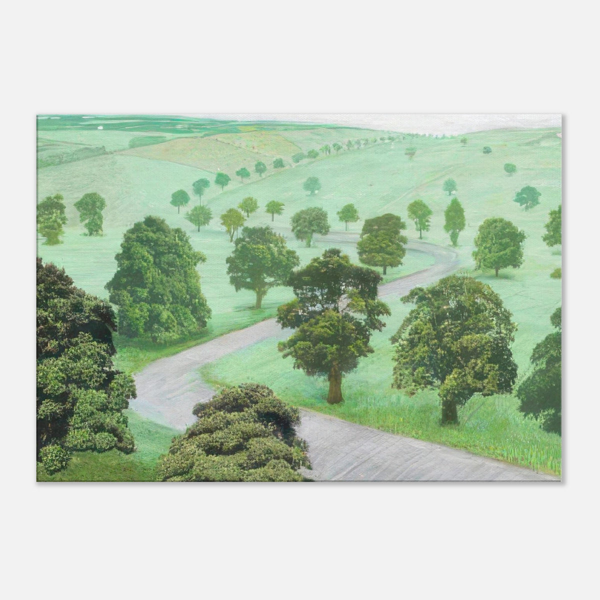 David Hockney canvas print of Green Valley, showing open fields, flowering trees and a winding road in soft, misty colours.